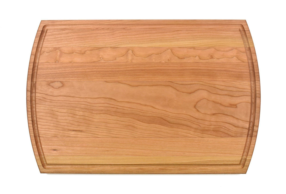 http://www.haileyhome.com/cdn/shop/products/cherry-cutting-board-with-arched-sides-and-juice-groove-105-x-16-656396_1200x1200.jpg?v=1628781769