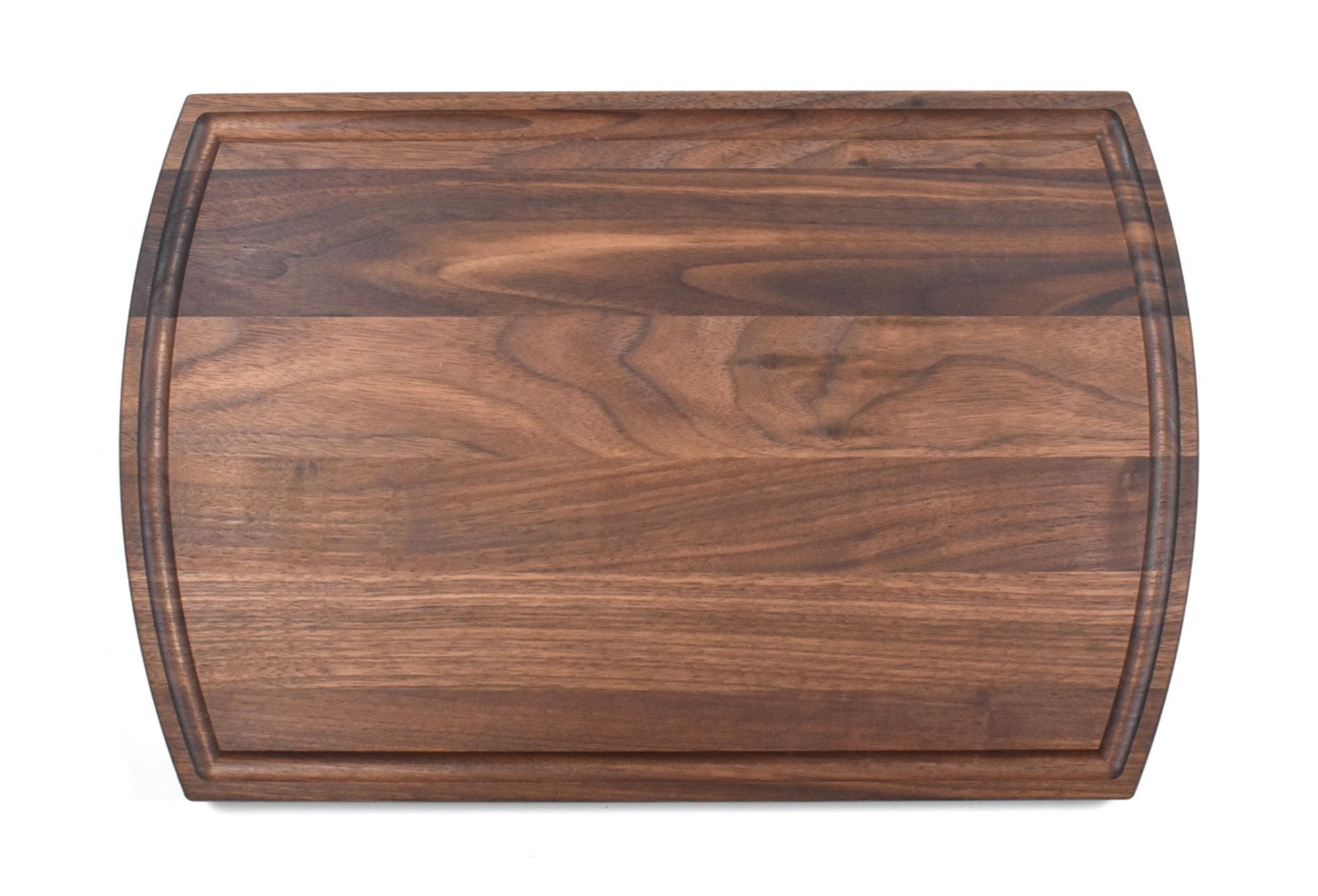https://www.haileyhome.com/cdn/shop/products/personalized-large-walnut-cutting-board-with-juice-groove-105-x-16-bulk-discounts-825575_1024x1024@2x.jpg?v=1628784605